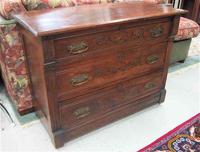 Appraisal: A VICTORIAN WALNUT CHEST OF DRAWERS Eastlake influence American c