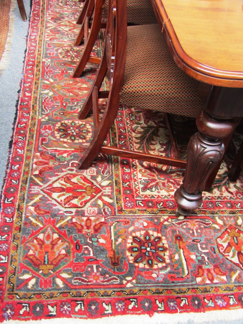 Appraisal: A Tabriz carpet Persian the madder field with a bold