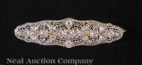 Appraisal: An Art Deco White Gold Filigree and Diamond Brooch set