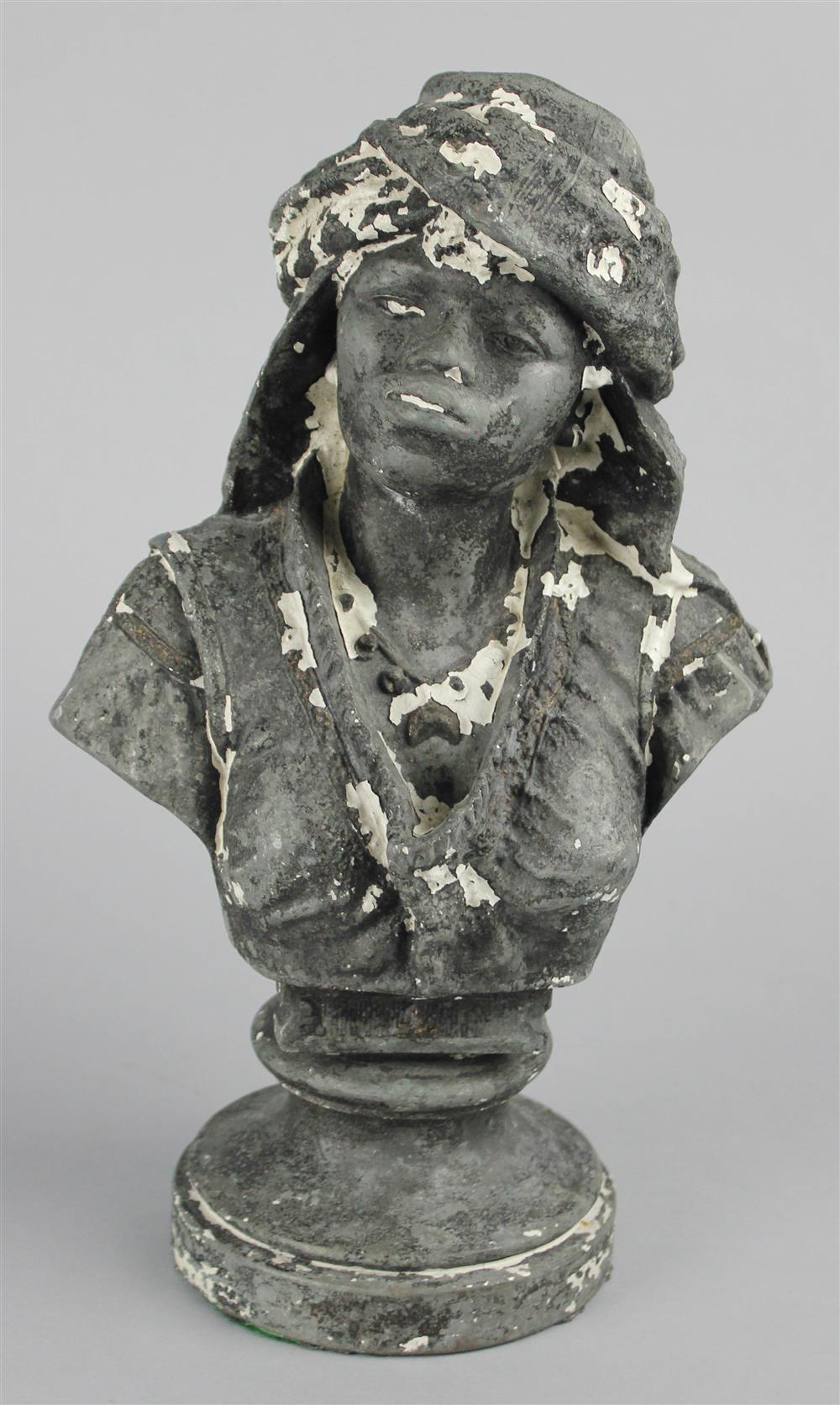 Appraisal: CAST IRON SCULPTURE OF AN AFRICAN AMERICAN FIGURE with some