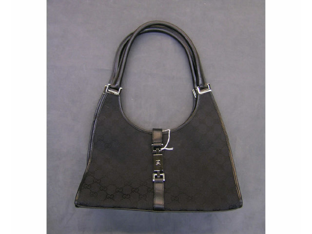 Appraisal: Gucci handbag black logo fabric with black leather trim and