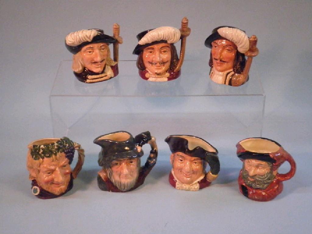 Appraisal: Seven medium sized Royal Doulton character jugs Athos Porthos Aramis