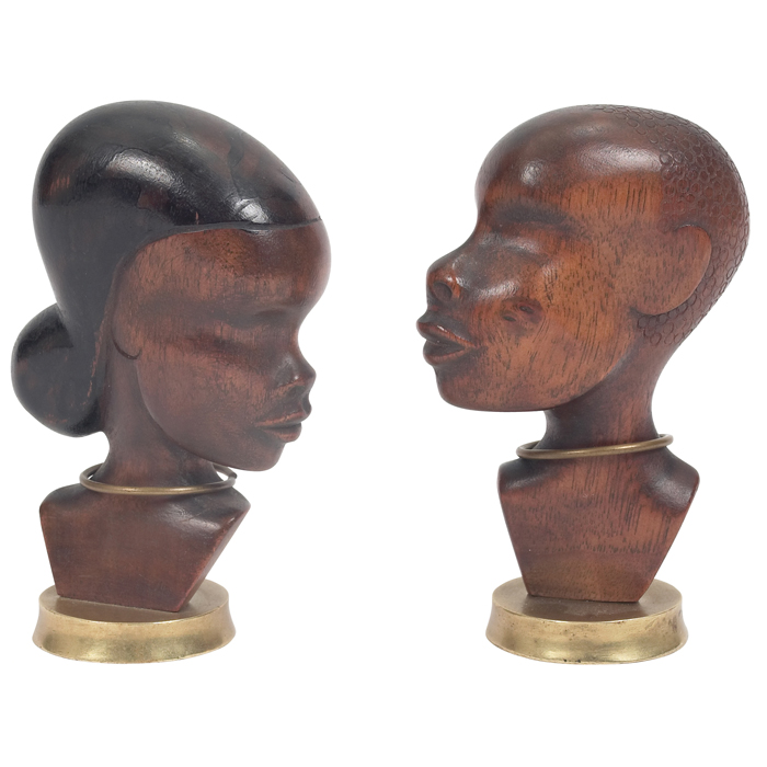 Appraisal: Hagenauer figures pair male and female busts in carved wood