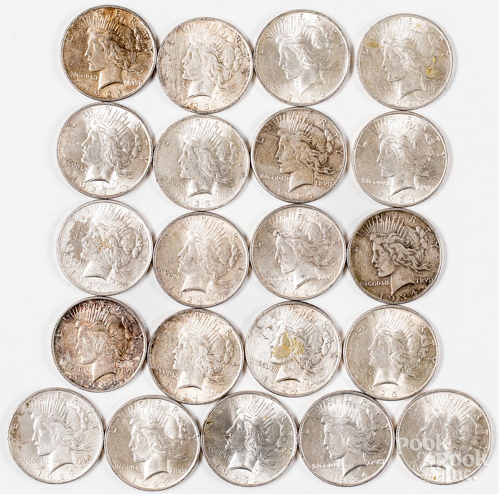 Appraisal: Twenty-one Peace silver dollars Twenty-one Peace silver dollars In-House shipping