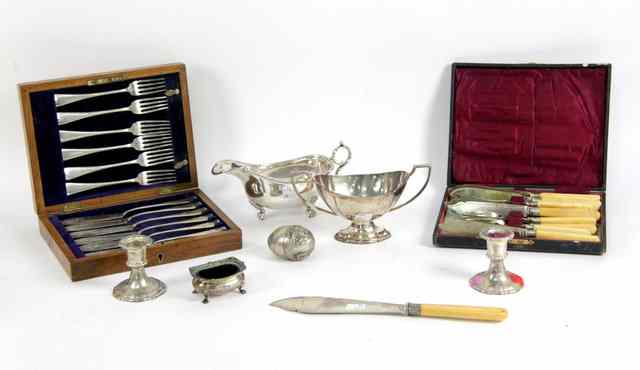 Appraisal: A cased set of fish knives and forks to serve