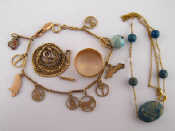 Appraisal: A mixed lot comprising a carat gold charm bracelet charms