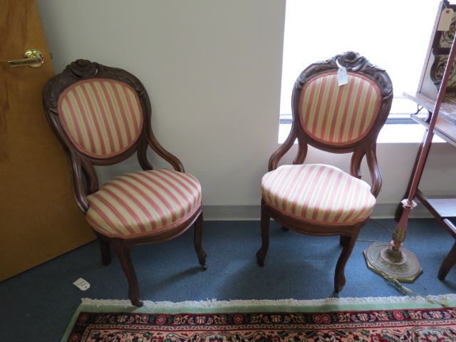 Appraisal: Pair of Carved Walnut Chairs oval medallion backs floral carving