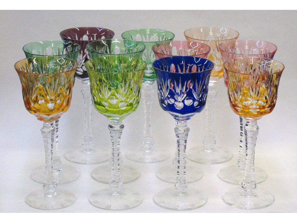 Appraisal: Set of eleven harlequin coloured flash etched cut glass drinking