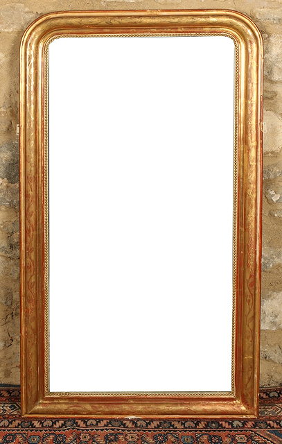 Appraisal: A LATE TH CENTURY GILTWOOD CONSOLE MIRROR with engraved and