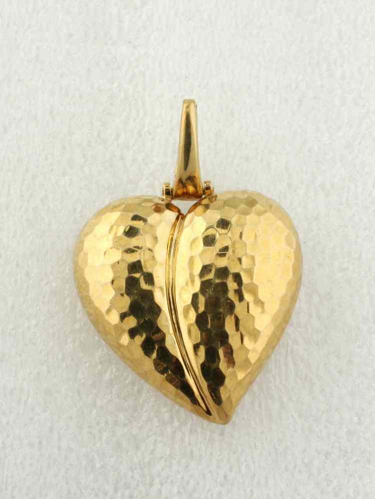 Appraisal: PENDANT - One K yellow gold hand hammered design heart