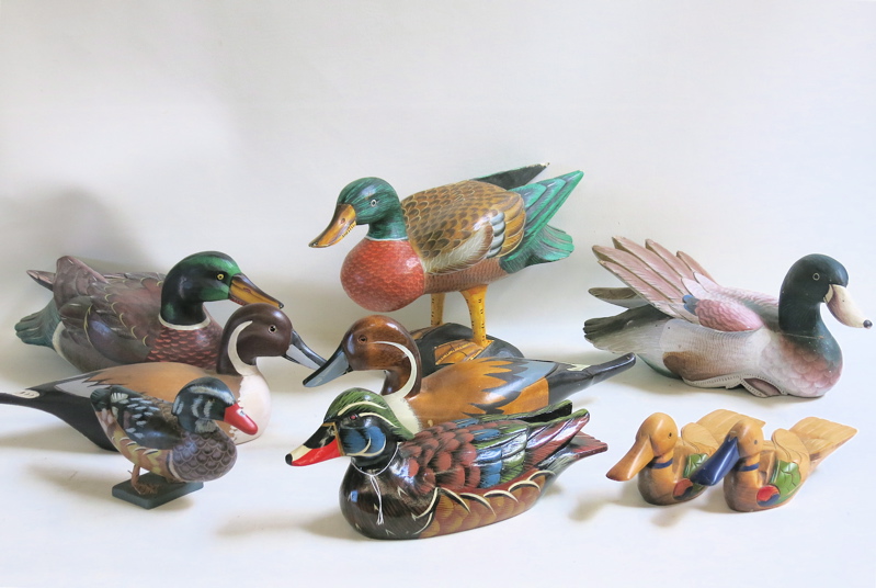 Appraisal: A COLLECTION OF NINE CARVED AND PAINTED WOOD DUCKS hand