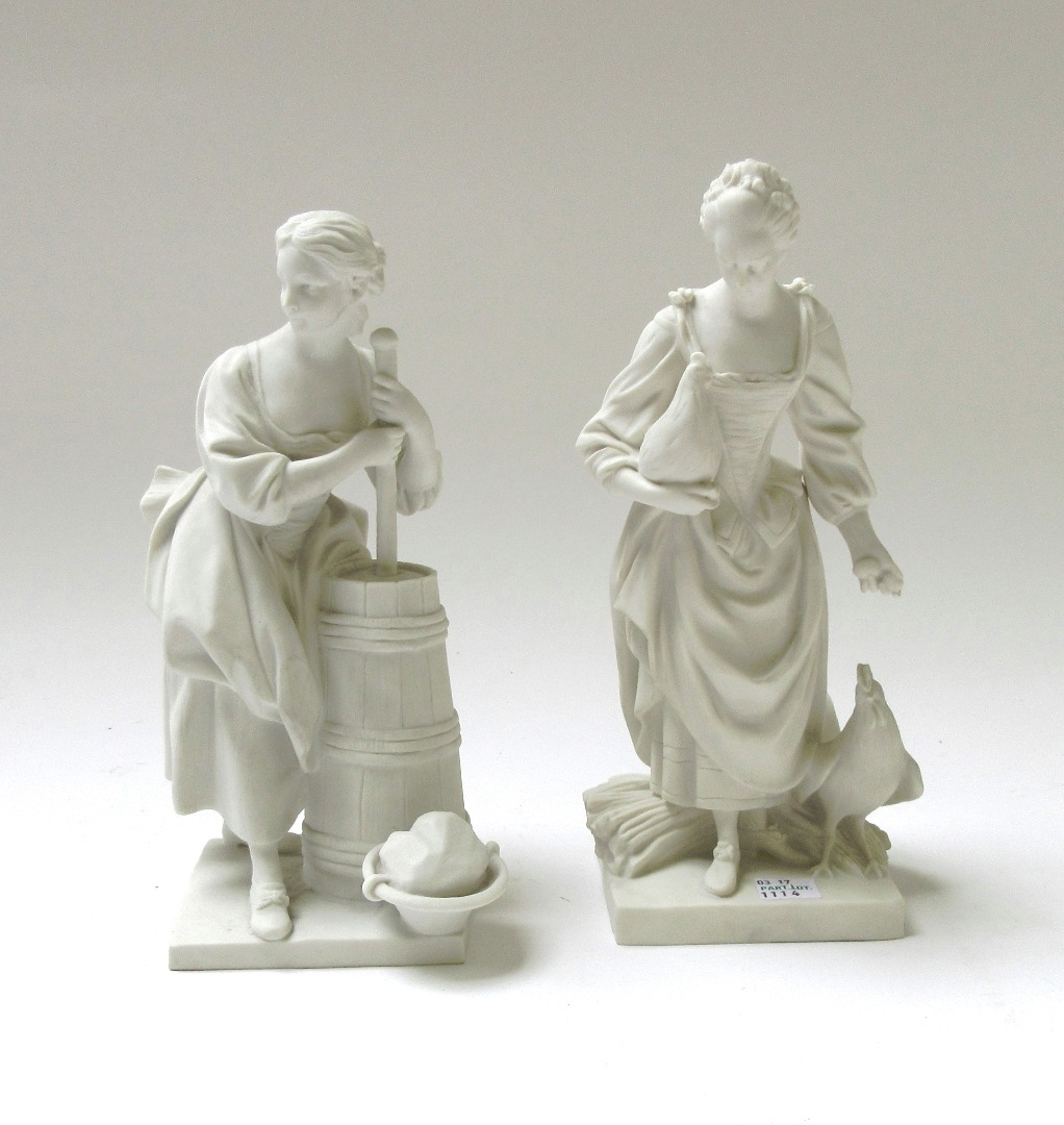 Appraisal: A pair of S vres biscuit groups of La Batteuse