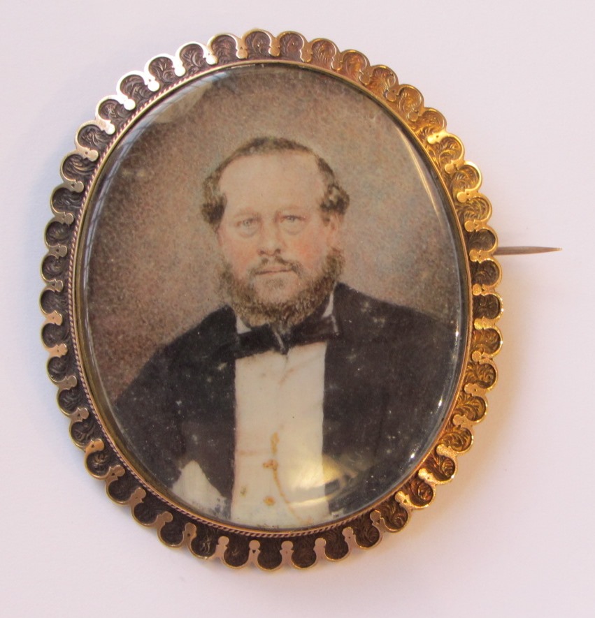 Appraisal: A Victorian oval brooch glazed with the portrait miniature of