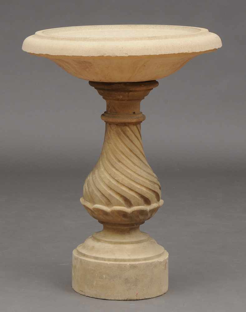 Appraisal: BAROQUE STYLE CAST STONE BIRD BATH The shallow bowl on