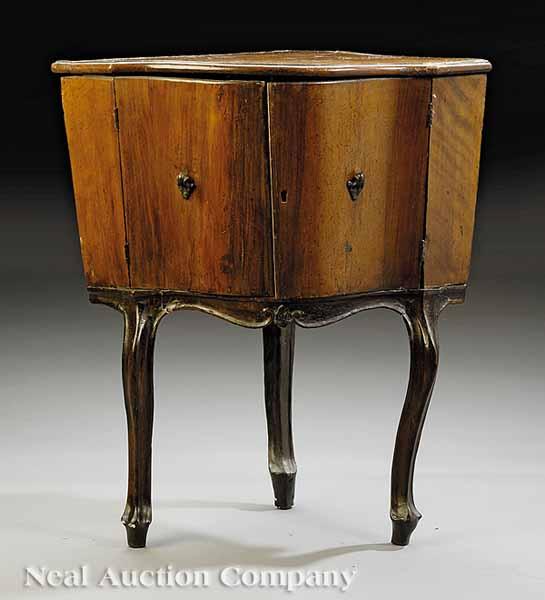 Appraisal: A Continental Rococo Fruitwood Encoignure mid-to-late th c possibly Italian