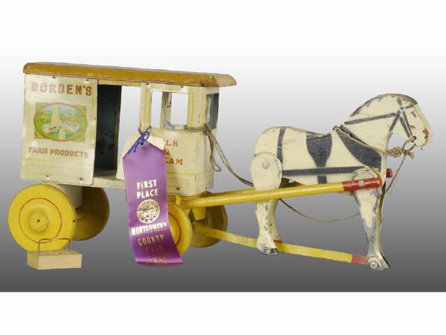 Appraisal: Borden's Milk Wagon Horse-Drawn Toy Description Metal and wood All