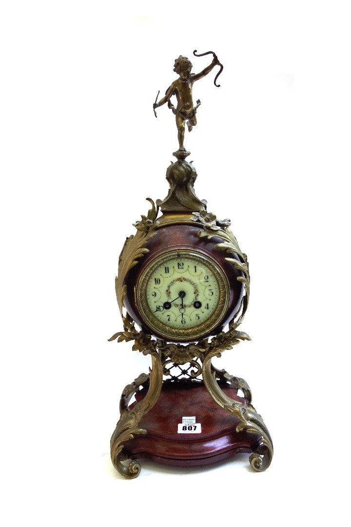 Appraisal: A German marble bronze mounted mantel clock th century surmounted