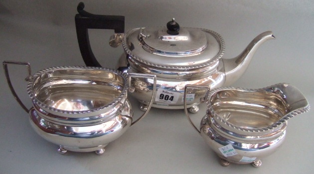 Appraisal: A silver three piece tea set comprising a teapot with