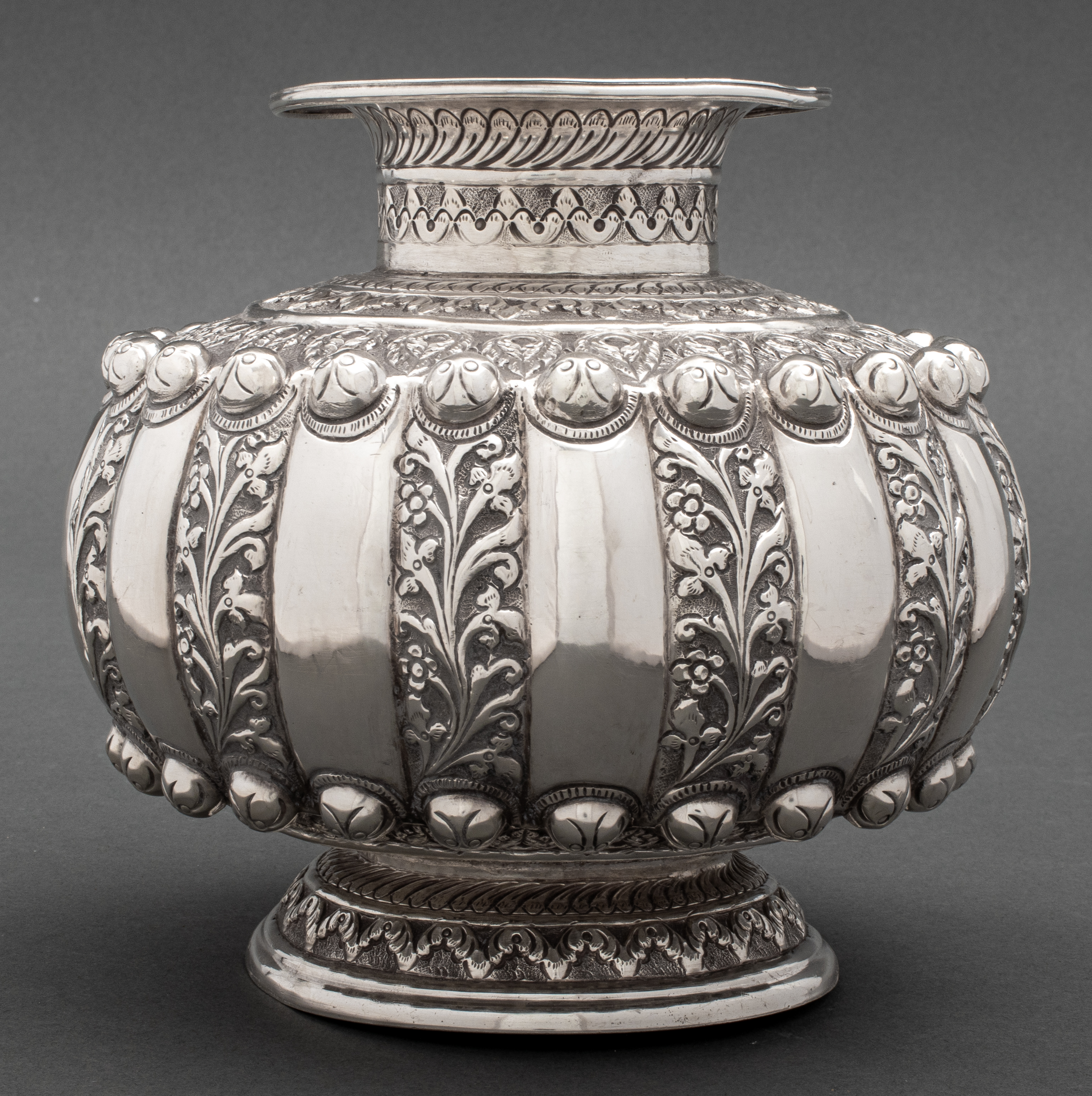 Appraisal: PERSIAN STERLING VASE WITH FOLIATE DECORATION Persian sterling silver marked