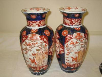 Appraisal: A PAIR OF JAPANESE IMARI PORCELAIN VASES of baluster form