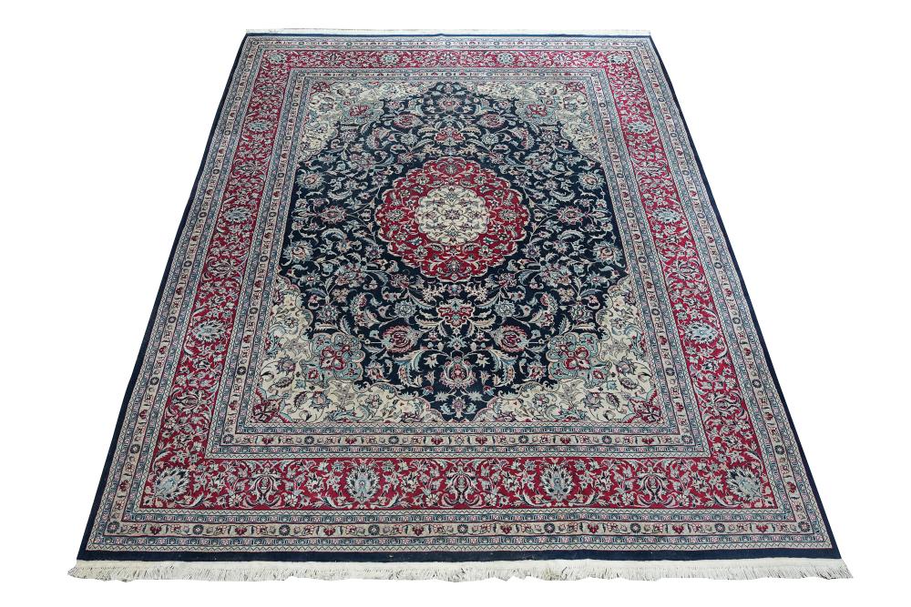 Appraisal: INDO-PERSIAN RED BLUE CARPETCondition in need of cleaning ' x