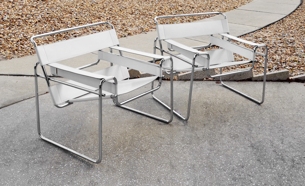 Appraisal: PAIR OF WASSILY CHAIRS Bent chromed steel and white leather