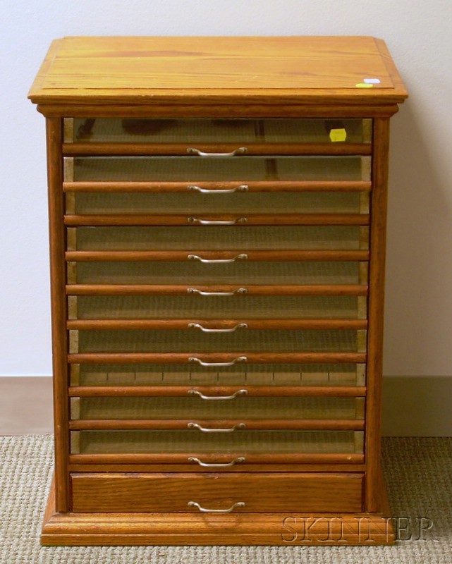 Appraisal: Late Victorian Oak and Glass Eleven-Drawer Retail Countertop Watch Cabinet