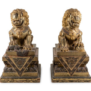 Appraisal: A Pair of Large Chinese Giltwood and Composition Buddhistic Lions