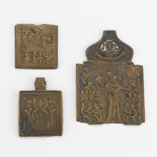 Appraisal: THREE BRASS MINIATURE ICONS Three small brass Christian icons probably