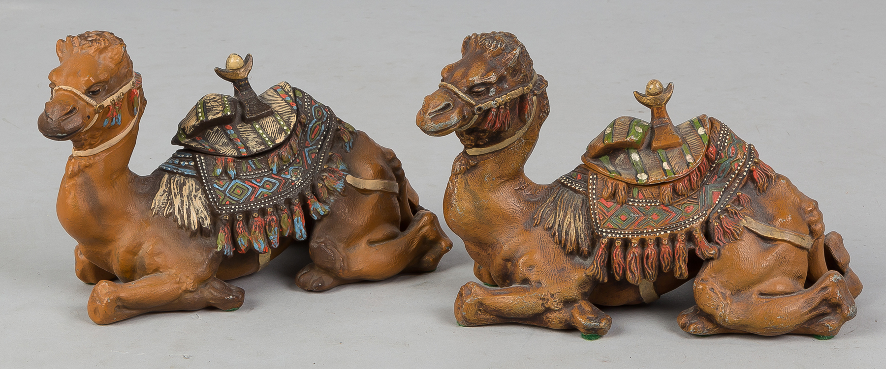 Appraisal: Pair Patinaed Metal Camel Inkwells Early th century