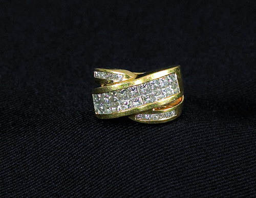 Appraisal: K yellow gold and platinum diamond band containing thirty-two square