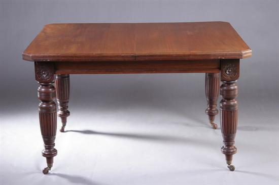 Appraisal: VICTORIAN WALNUT DINING TABLE Late th century Canted-corner rectangular top