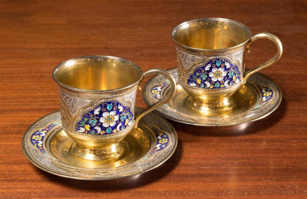 Appraisal: FOUR-PIECE RUSSIAN ENAMELED SILVER TEACUP AND SAUCER SET fine silver