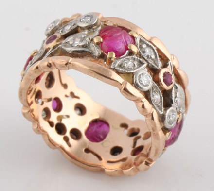 Appraisal: K rose and white gold hand carved stones and diamonds