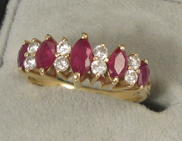 Appraisal: RUBY DIAMOND AND FOURTEEN KARAT GOLD RING set with five