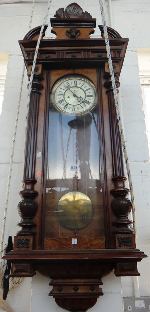 Appraisal: A walnut cased Vienna regulator wall clock German late th