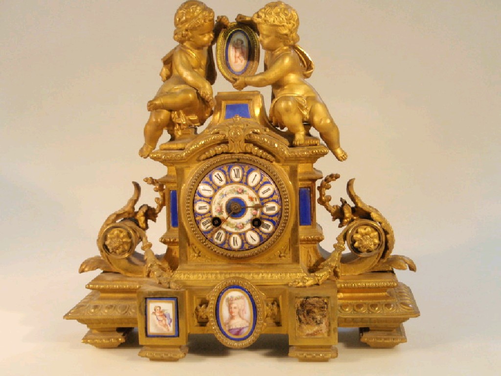 Appraisal: A thC French gilt metal mantel clock with eight day