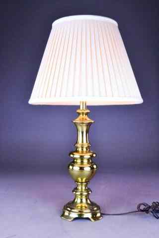 Appraisal: Stiffel Style Table LampA polished brass footed table lamp with