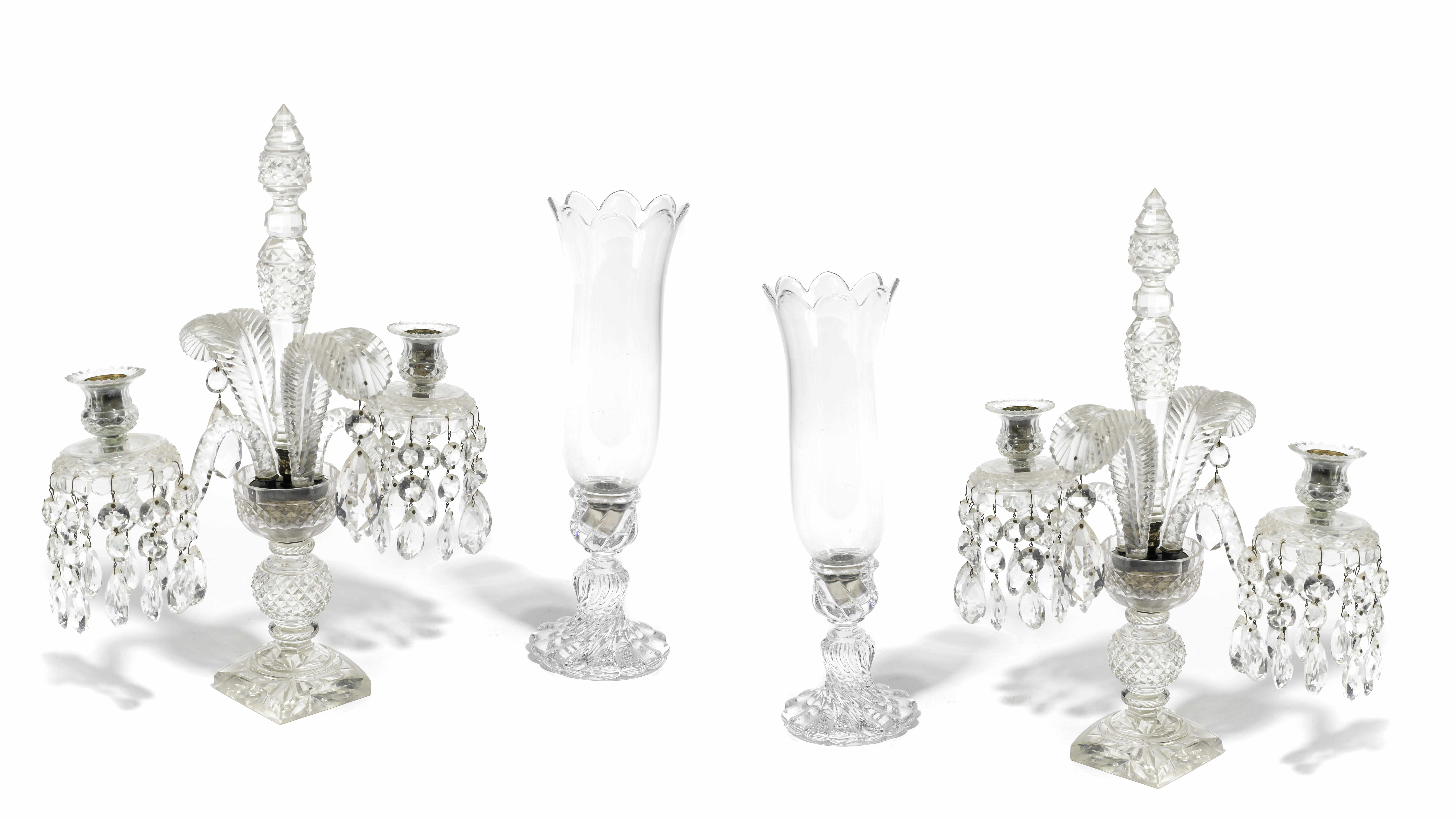 Appraisal: A pair of molded glass three light girandoles Together with