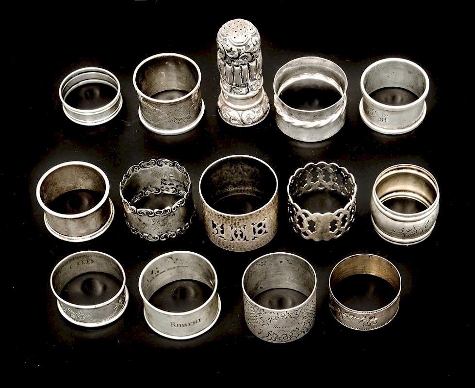 Appraisal: English American sterling napkin rings pepper shaker English American sterling