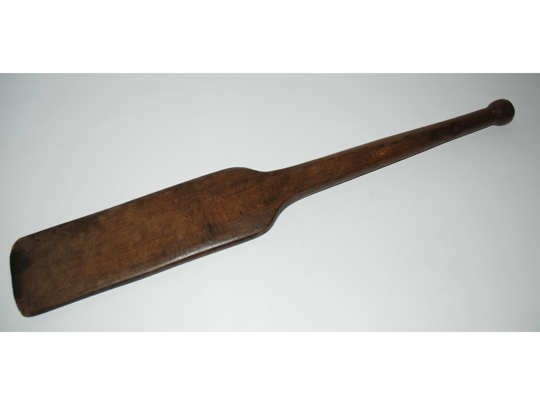 Appraisal: A wooden paddle