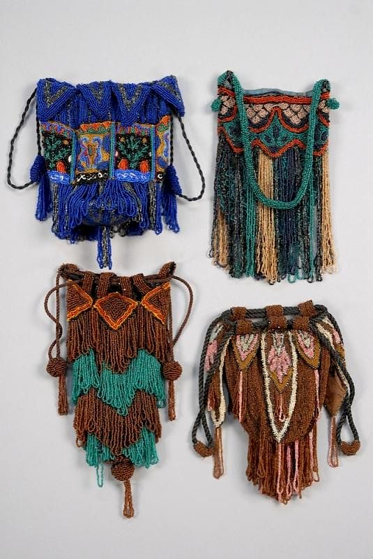 Appraisal: FOUR ART DECO FRINGED BEADED BAGS All drawstring pouches with