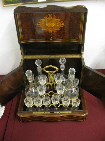 Appraisal: French Victorian Crystal Decanter set inlaid cabinet swing doors signed