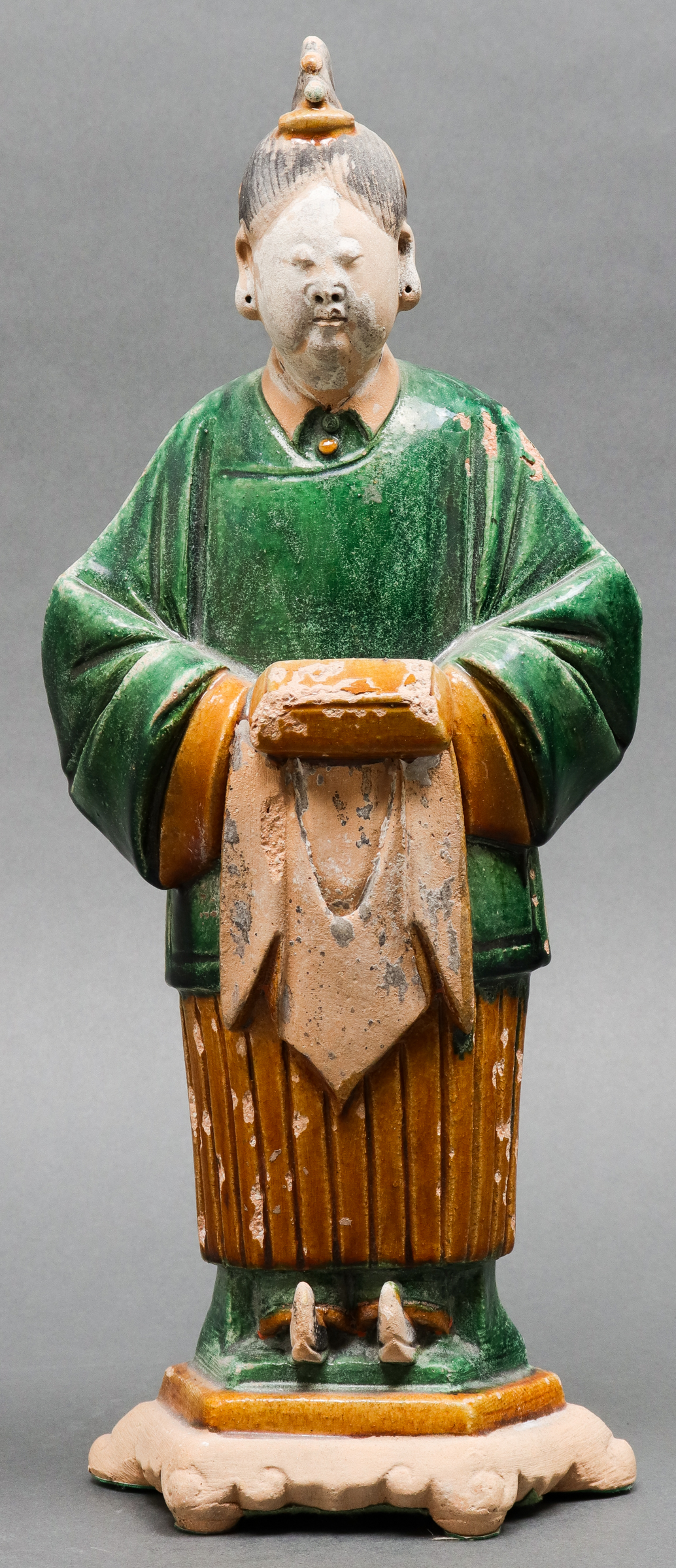 Appraisal: CHINESE MING DYNASTY SANCAI POTTERY ATTENDANT Chinese Ming Dynasty -