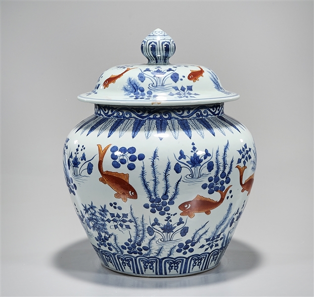 Appraisal: Chinese blue red and white porcelain covered vase fish motif