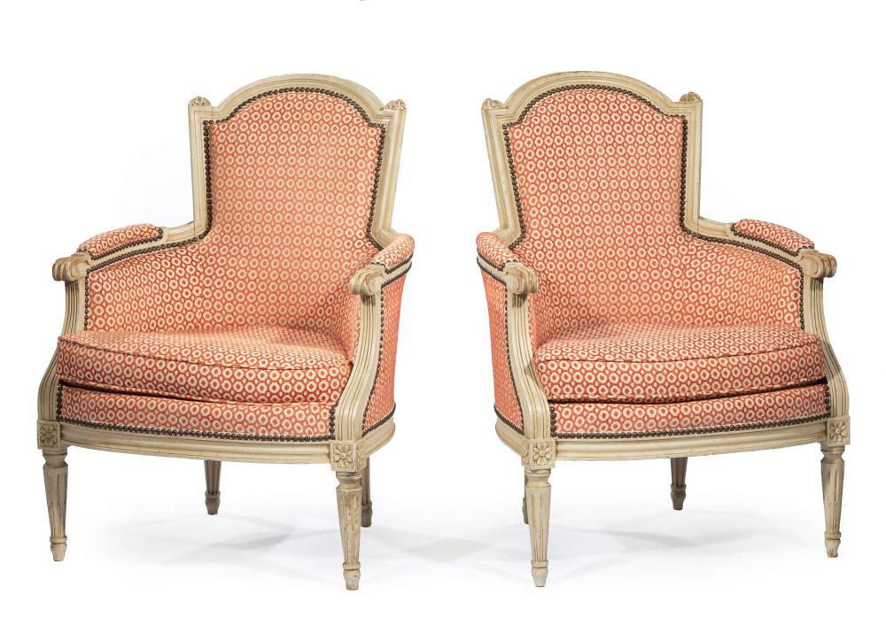 Appraisal: Pair of Louis XVI-Style Creme Peinte Bergeres attractively upholstered nailhead