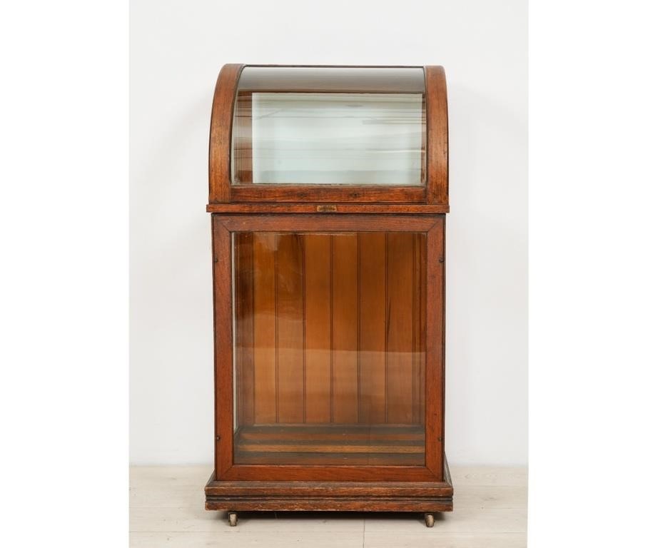 Appraisal: Oscar Onken Co oak and glass cane display case late