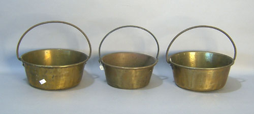 Appraisal: Three brass pails th c with fixed handles tallest -