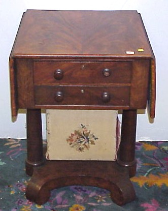 Appraisal: th C Empire mahogany sewing stand two drawer drop leaves