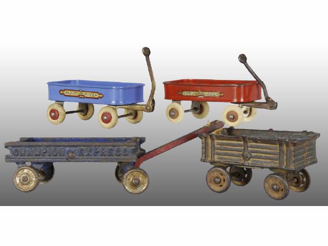 Appraisal: Lot of Cast Iron and Tin Four Wagon Toys Description